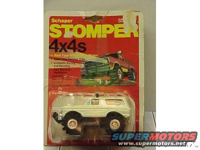 White 1979 Ford Bronco toy with black wheels and chrome accents, in plastic packaging