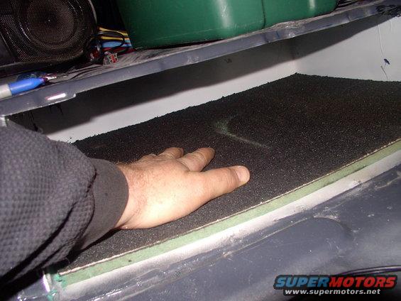 img_0094.jpg This has rubberized top coating and a half inch of insulation underneath and should stop the amps from sliding around.