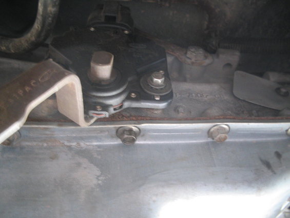 close-up of transmission shift linkage and pan