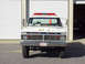 1969 Ford 427 - Front view of a white Ford fire truck, marked "SQUAD - 111".