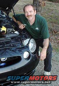 crouchingcarteralone.jpg The day I got it running again after the camshaft failure and of course well before Supercharger modification