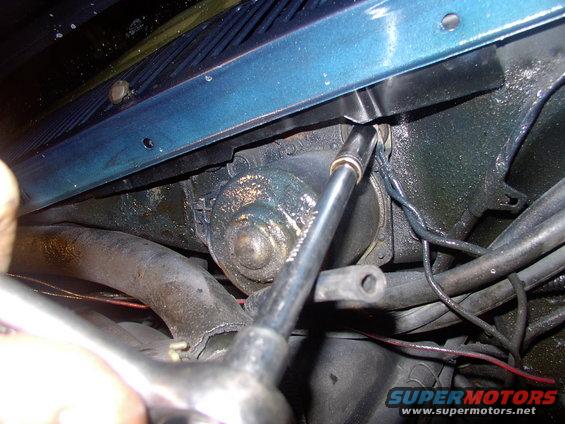 img_0154.jpg Then it's just a matter of twisting off the 3 mounting bolts and out comes the motor.  As the last photo suggested, it's very likely the ground terminal will spin with the nut and break off upon removal. I had to re-solder a new round terminal onto the wires.