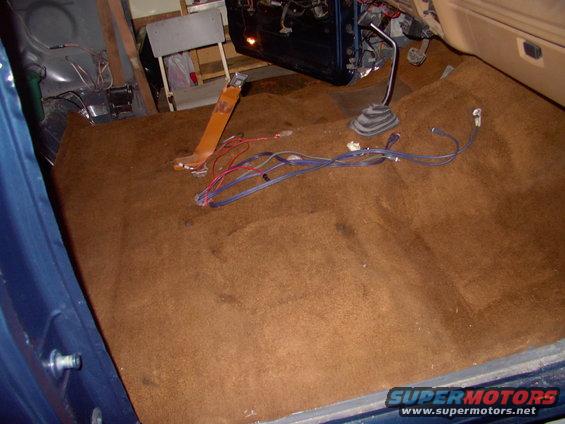 img_0120.jpg It's much easier to run all the sterro wiring, even with the rug down, than after the front seats get bolted in.