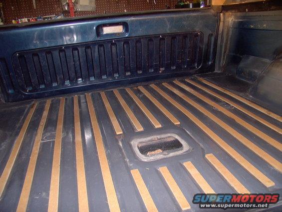 img_0143.jpg They fit beautifully. In spite of all the abuse I'd given the truck, when I lifted the rugs every single slat was right where I'd laid them.
