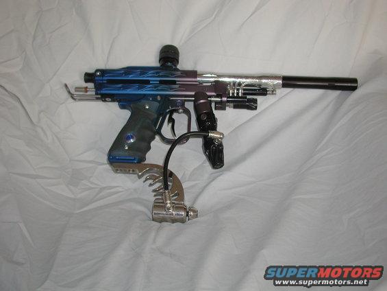 Blue and purple paintball marker with flame graphics and chrome accents