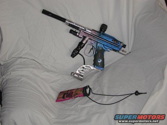 Blue and purple paintball gun with chrome accents on a white surface