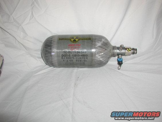 Compressed gas cylinder with 4500 PSI marking and radiation symbol