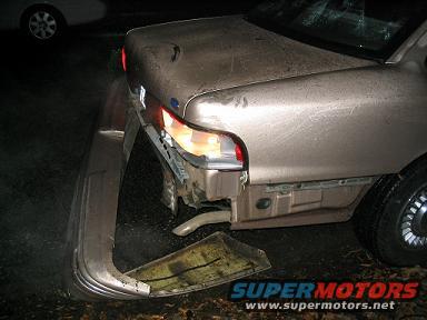 1999 Ford Crown Victoria rear bumper detached, taillight broken