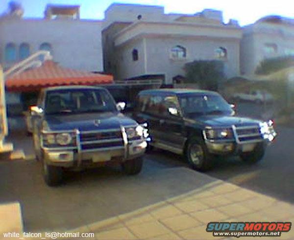 Front view of two 2000 Mitsubishi Monteros parked