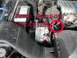 1988 Ford Crown Victoria - Close-up of an engine bay, highlighting the location of the temperature sensor with text and a red circle.