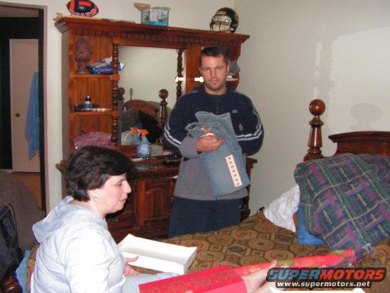 pict0056.jpg Margaret wrapping presents for Rich.