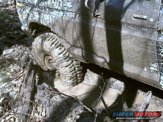 1978 Ford F-250 wheel stuck in mud