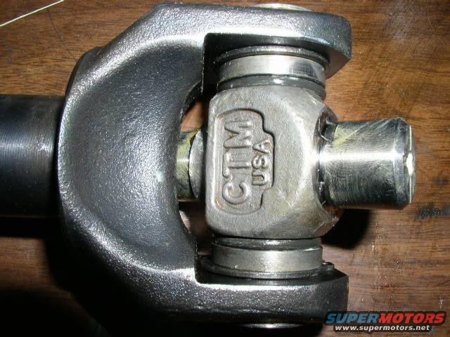 CTM USA U-joint part on wooden surface
