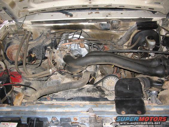 img_0039.jpg Fuel-injected 302, mostly stock.  MSD ignition, blaster TFI coil, shorty headers, dual flowmasters.  