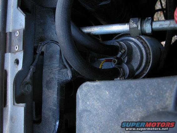 trannyfilter-blue0510.jpg Remote PermaCool tranny filter with sending unit loccated next to upper radiator where the stack tranny line enters.  I thought this a better location than down by the frame.