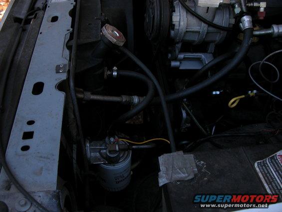 Remote tranny filter. Line enters from tranny then into radiator then through dual tranny coolers.