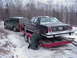1986 Ford LTD Crown Victoria - My stepfather making sure everything is tied down, towing the car home was a pain, I didn't know our Yukon could make s…