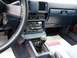 1984 Toyota Celica - Interior view of a 1984 Toyota Celica, the dashboard, center console, and floor mat.