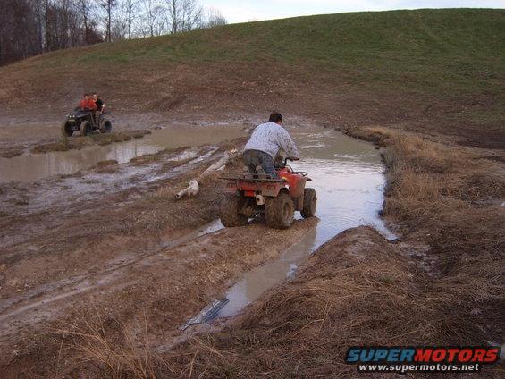 SHANE ATTEMPTING A MUDHOLE