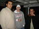 2000 Ford F-450 - Three men pose for a photo while gathered outdoors at night.