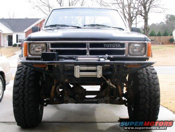 Toyota truck front end with winch and large tires
