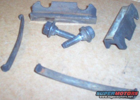 brakekeysbolts.jpg '83 Dana44IFS Brake caliper keys, slide springs, & bolts.  Used from the late 70s until ~'84 on 2 & 4WD.

--------------------------------------------------------------------------------

TSB 98-5A-13 NEW SPECIFICATION - Silicone Brake Caliper Grease and Dielectric Compound to be used for Disc Brake Caliper Slides

Publication Date: MARCH 18, 1998 

FORD:
1984-1994 TEMPO 
1984-1996 MUSTANG, THUNDERBIRD 
1985-1996 CROWN VICTORIA, ESCORT 
1986-1996 TAURUS 
1989-1996 PROBE 
1994-1996 ASPIRE 
1995-1996 CONTOUR

LINCOLN-MERCURY:
1982-1996 CONTINENTAL 
1984-1994 TOPAZ 
1984-1996 COUGAR 
1985-1996 GRAND MARQUIS 
1986-1996 SABLE, TOWN CAR 
1987-1989 TRACER 
1991-1994 CAPRI 
1991-1996 TRACER 
1993-1996 MARK VIII 
1995-1996 MYSTIQUE

LIGHT TRUCK:
1983-1996 RANGER 
1986-1996 AEROSTAR 
1990-1996 BRONCO, ECONOLINE, F SUPER DUTY, F-150-350 SERIES 
1991-1996 EXPLORER 
1993-1996 VILLAGER 
1995-1996 WINDSTAR 
MEDIUM/HEAVY TRUCK: 1990-1991 C SERIES 
1990-1996 F & B SERIES 

ISSUE: The use of petroleum-based grease as a lubricant in servicing disc brakes is no longer acceptable because it may be incompatible with the rubber material used in the disc brake system. If petroleum-based grease is used to lubricate any part of the disc brake system, it could cause rubber parts to swell if lubricant contacts the rubber material. 

ACTION: Refer to the following Servicing Procedures for details. 

DISC BRAKE SERVICING
CAUTION: DO NOT USE PETROLEUM-BASED SERVICE GREASE (SUCH AS FORD DISC BRAKE CALIPER SLIDE GREASE D7AZ-19590-A) TO LUBRICATE DISC BRAKE CALIPER SLIDE PINS OR RUBBER DUST BOOTS. PETROLEUM-BASED GREASE MAY CAUSE EPDM RUBBER TO SWELL. 

When servicing any disc brakes, lubricate necessary components by applying Silicone Brake Caliper Grease and Dielectric Compound (D7AZ-19A331-A (Motorcraft WA-10)) or an equivalent silicone compound meeting Ford Specification ESE-M1C171-A. Refer to the appropriate Service Manual for specific service details. 

DRUM BRAKE SERVICING 
When servicing drum brakes, apply Silicone Brake Caliper Grease and Dielectric Compound (D7AZ-19A331-A (Motorcraft WA-10)) or an equivalent silicone compound meeting Ford Specification ESE-M1C171-A to the contact points between the brake shoes and the drum backing plates for lubrication. 

NOTE: DISC BRAKE CALIPER SLIDE GREASE D7AZ-19590-A SHOULD NO LONGER BE USED FOR DISC BRAKE CALIPER SLIDE LUBRICATION. 

OTHER SERVICE APPLICATIONS
Existing inventory of D7AZ-19590-A may be used for all other Service Manual procedures. Once material is exhausted, all vehicle procedures specifying Disc Brake Caliper Slide Grease (D7AZ-19590-A) should use Silicone Brake Caliper Grease and Dielectric Compound (D7AZ-19A331-A). 

PART NUMBER : PART NAME 
[url=http://www.fcsdchemicalsandlubricants.com/main/product.asp?product=Electrical Grease&category=Greases]D7AZ-19A331-A : Silicone Brake Caliper Grease And Dielectric Compound

[img]http://www.fcsdchemicalsandlubricants.com/main/images/Products/XG12.jpg[/img][/url]

OTHER APPLICABLE ARTICLES: NONE 
SUPERSEDES: 95-21-02

[url=http://www.supermotors.net/registry/media/919513][img]http://www.supermotors.net/getfile/919513/thumbnail/06greases.jpg[/img][/url]