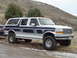 1994 Ford C-350 (Centurion Conversions) - This Ford Bronco SUV, likely from the early 1990s, is modified for off-road use.