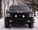 1993 Ford Bronco - Front view of a 1993 Ford Bronco in a snowy environment, equipped with a bull bar.