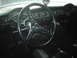 1978 Ford Bronco - Classic car interior a custom steering wheel and dashboard gauges.