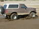 1993 Ford Bronco - This 1992 Ford Bronco is struggling to get through a muddy off-road track.