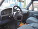 1992 Ford Bronco - Interior view of a 1992 Ford Bronco XLT, highlighting the dashboard and seating.
