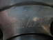 1992 Ford Bronco - A close-up view of a wheel shows the embossed "MT" logo and some horizontal line details.