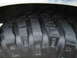 1992 Ford Bronco - Aggressive off-road tire tread pattern visible on a vehicle part.