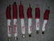 1994 Ford Bronco - Set of six Rancho RS 5000 shock absorbers, likely for a lifted vehicle, laid out on a carpeted surface.