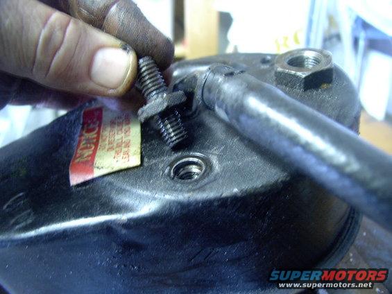 Mine had one stud on the back of the pump to hold the 78 van bracket on with a nut.