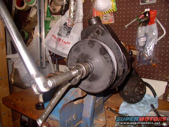 img_0051.jpg The pulley puller also installs the pulley onto the new pump shaft very well, by tightening it up until it contacts the shaft snout (stop at that point).