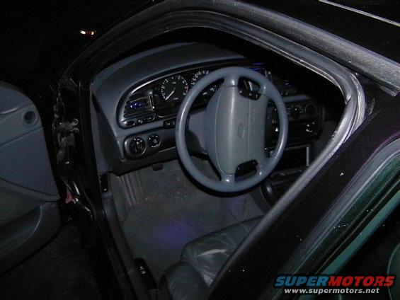 1995 Ford Contour interior with gray dashboard and steering wheel