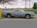 1973 Ford Ranchero - Side profile of a gray 1973 Ford Ranchero pickup truck parked outdoors.