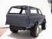 1979 Ford Bronco - Model SUV rear view shows large tires and a dark gray body.