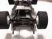 1979 Ford Bronco - Underside view of a model vehicle chassis, showing the suspension and tires.