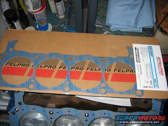 img_4504.jpg Got my heads back decided I would knock out the head gaskets. Bought Felpro, they are clearly marked with a Front imprint on the gasket, make sure you have them facing the right way. You should have two engine dowells per side that will hold the gasket in place.
