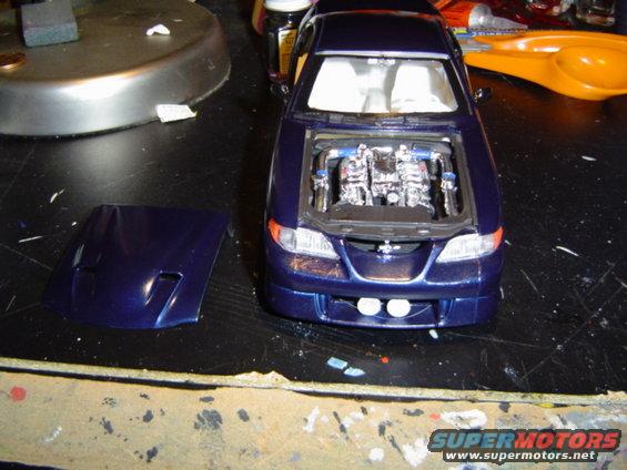 Model car with engine exposed, hood off