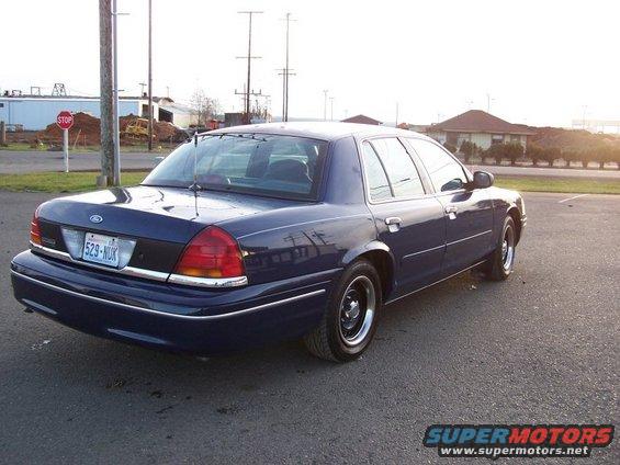 1998 Ford Crown Victoria, rear quarter view. License plate 529-NUK