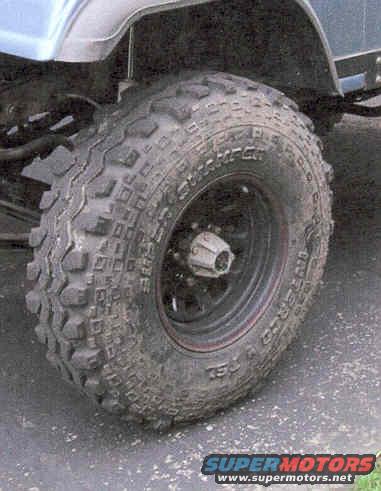 Close-up of an off-road tire with 'SUPERIOR' and 'CHAMPION' visible