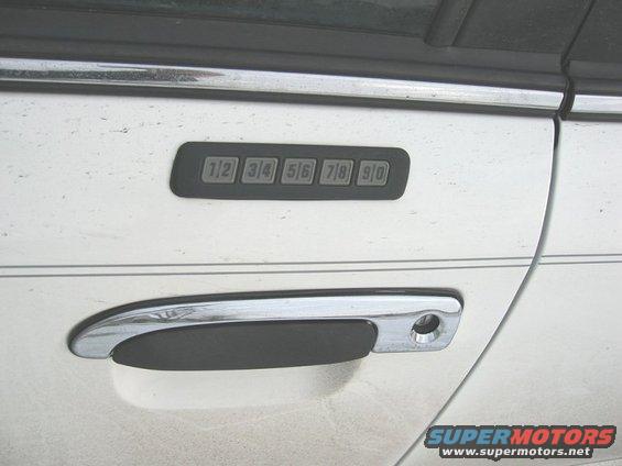 1997 Ford Crown Victoria door keypad and chrome handle