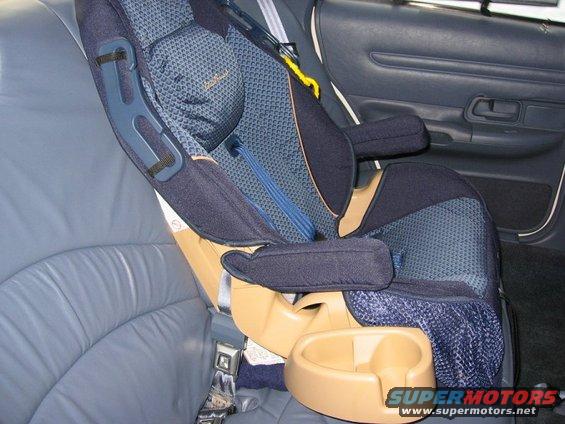 Interior view of a 1997 Ford Crown Victoria with a child car seat installed