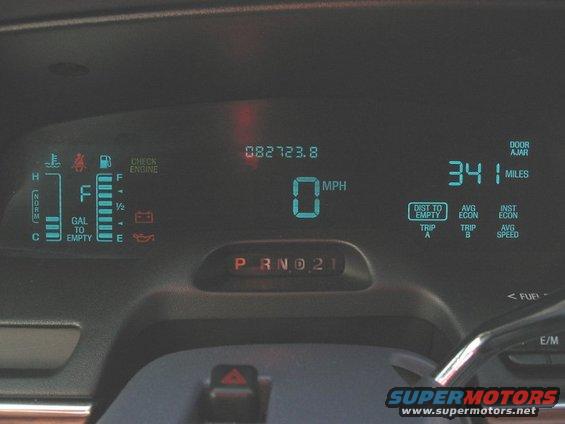 Digital dashboard showing 0 MPH, odometer 082723.8, and fuel gauge