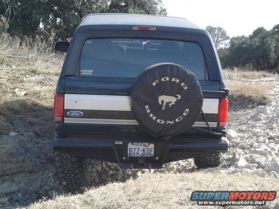 1995 Ford Bronco rear view with spare tire cover and Texas license plate B72-KDF