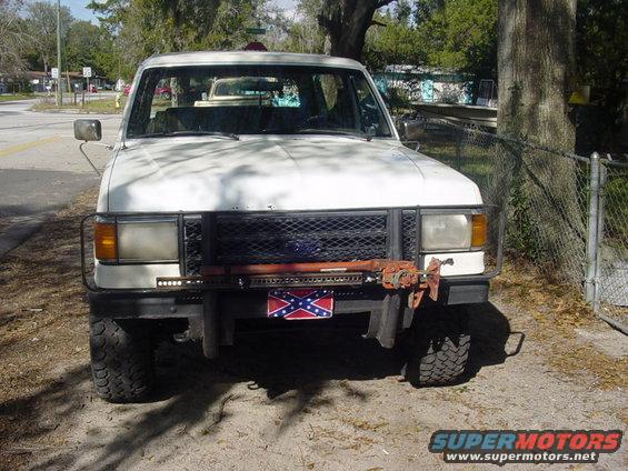 Hi-lift mounted to the brush guard with 4x rack from 4wheel parts.