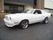 1978 Ford Mustang II - 1978 Ford Mustang II coupe, front 3/4 view, showing custom wheels and body lines.